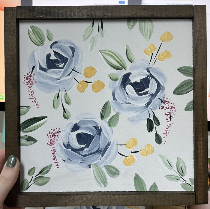 White Background Blue Floral Sign